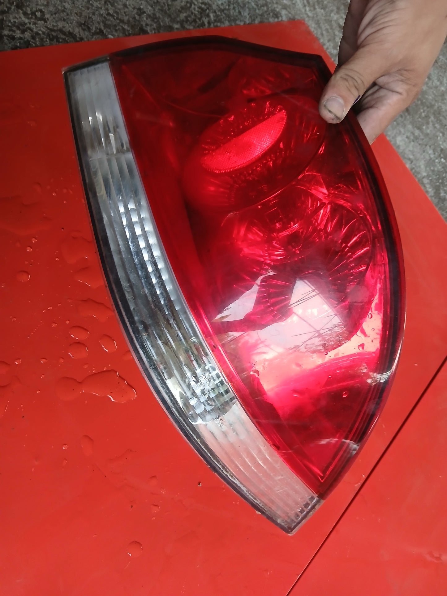 Mitsubishi Lancer Cedia Tail Light Driver Side ( with issue )