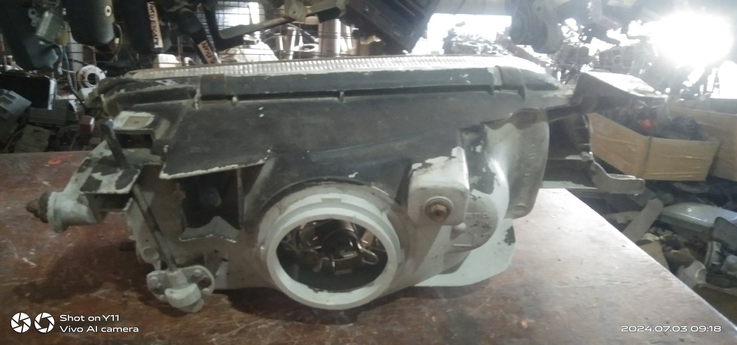 Lancer Itlog Head Light Passenger Side