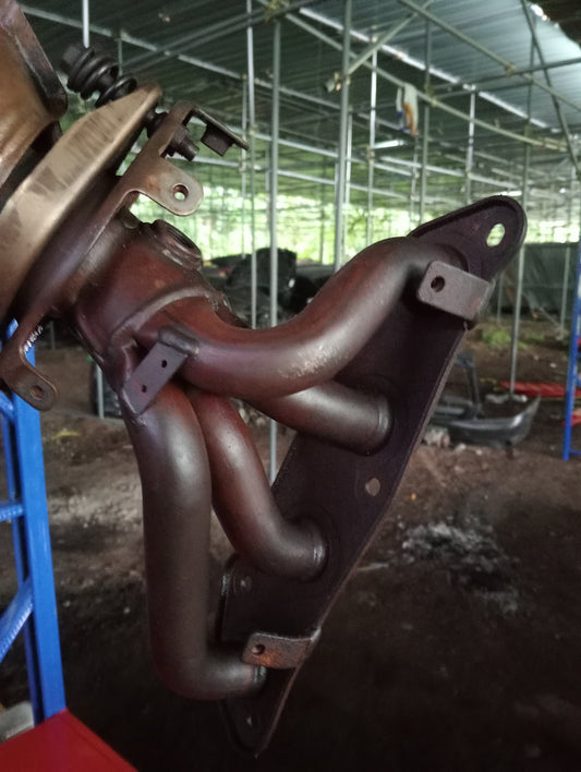 Nissan | Almera | Catalytic