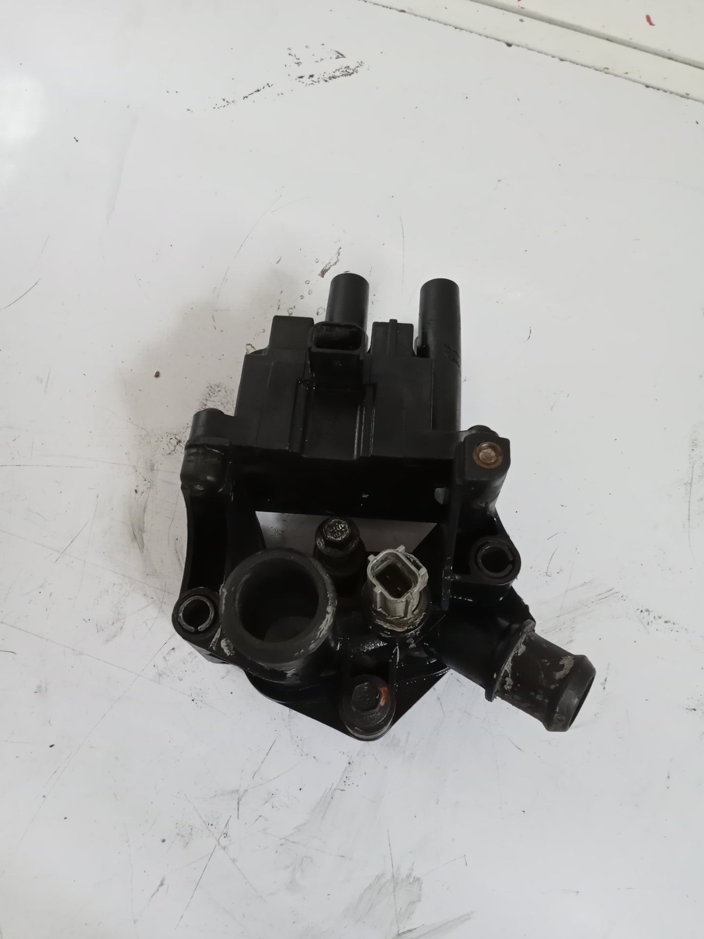 Coil Pack w Thermostat Housing| Ford Fiesta 1.4