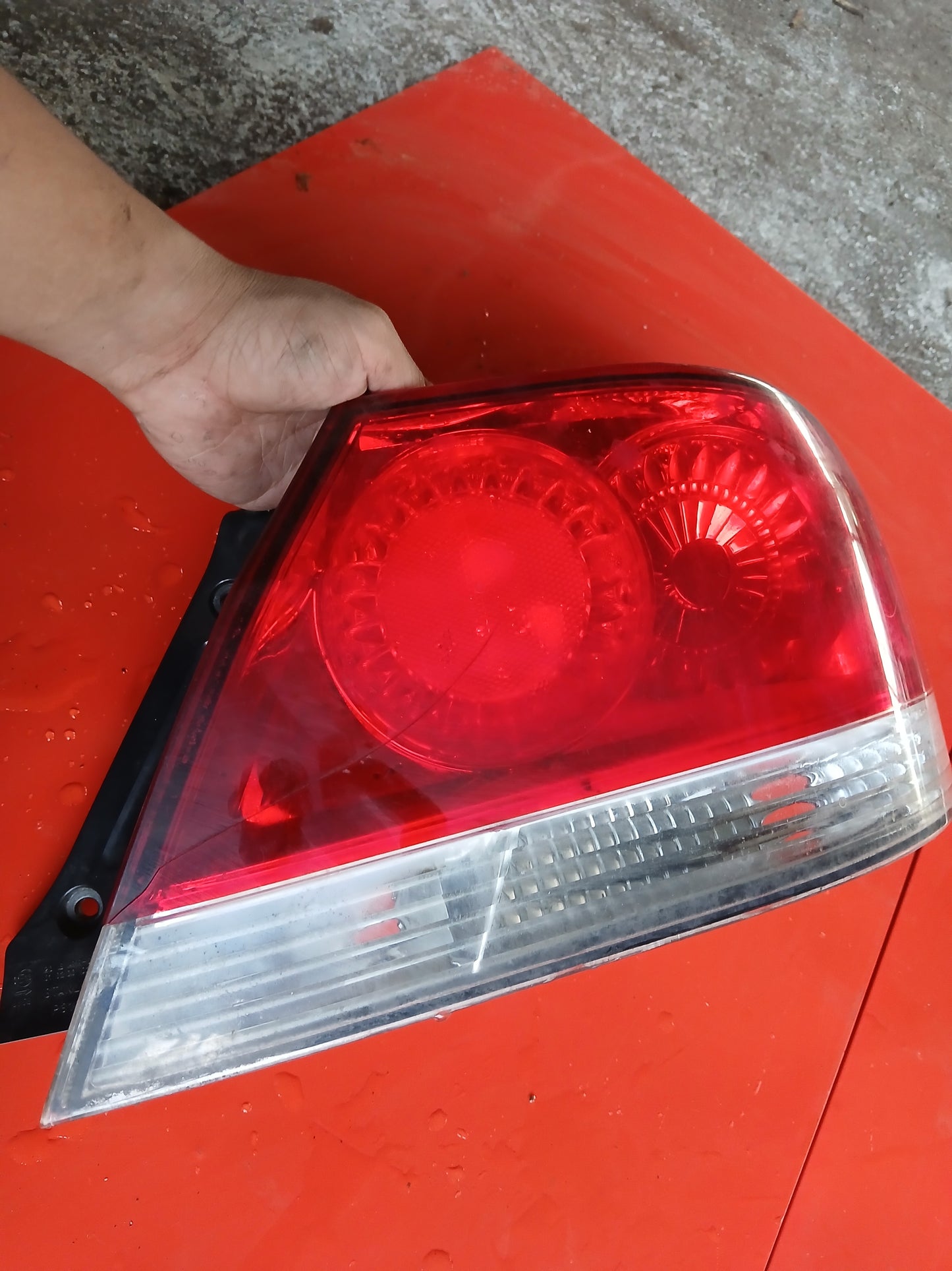 Mitsubishi Lancer Cedia Tail Light Driver Side ( with issue )